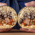 Chipotle steak burrito cut in half showing steak, rice, beans, and salsa