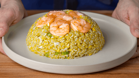 Din Tai Fung shrimp fried rice dome on white plate