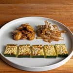 Hibachi vegetables with caramelized zucchini onion and mushrooms finished with garlic butter and sesame seeds
