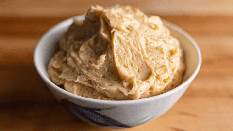 Benihana garlic butter in a small bowl showing garlic and soy sauce mixed into softened butter