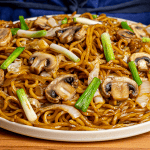 Benihana yakisoba noodles with mushrooms cabbage and green onion in sauce