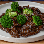 P.F. Chang's Beef with Broccoli with Mongolian sauce on a white plate