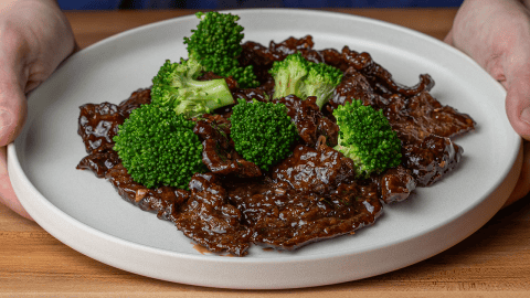 P.F. Chang's Beef with Broccoli with Mongolian sauce on a white plate