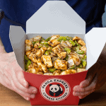 Panda Express black pepper chicken with celery and onion in a glossy black pepper sauce